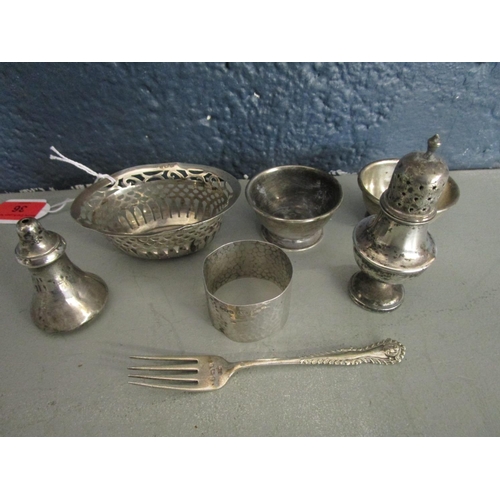 36 - A small quantity of silver items to include a pepperette, mixed dates and makers, total weight 18.4 ... 