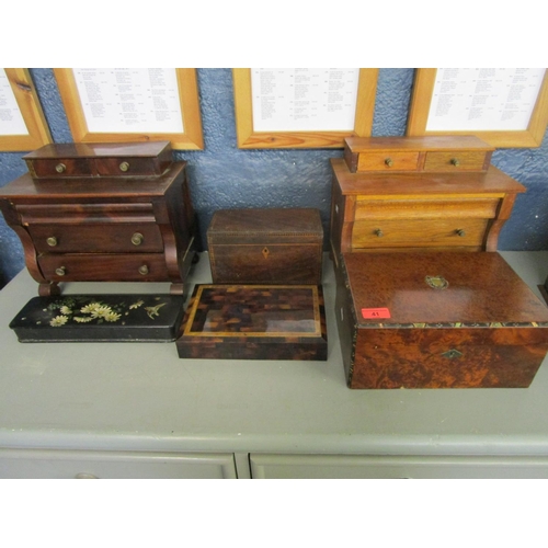 41 - A selection of wooden boxed to include a Victorian papermache glove box, two miniature chests in the... 