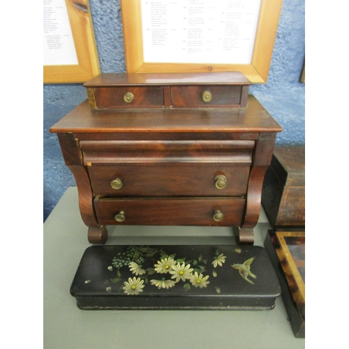 41 - A selection of wooden boxed to include a Victorian papermache glove box, two miniature chests in the... 