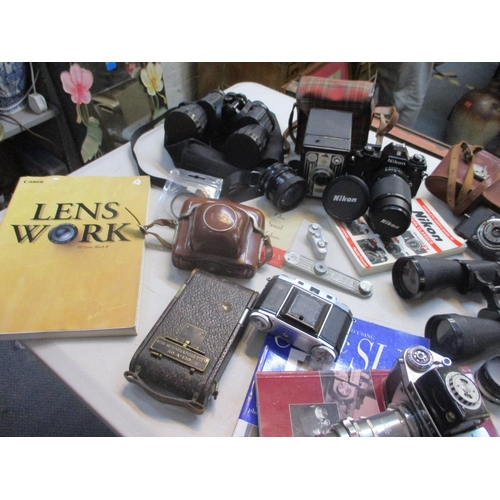 180 - Vintage cameras, lenses etc to include Nikon, Ihagee, Zeiss and a Coronet cub
Location: RAF
