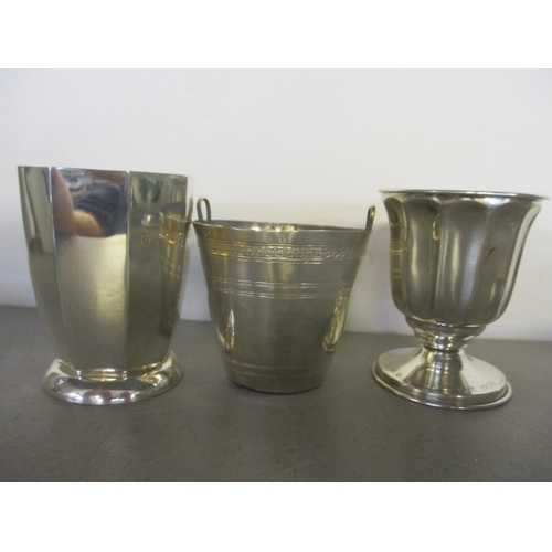 234 - Two small white metal vases, together with a white metal small basket
Location: 5.1