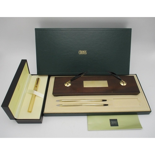 A Dunhill Gemline Classic gilt fountain pen with 14ct gold nib in Dunhill  box, together with a Cross