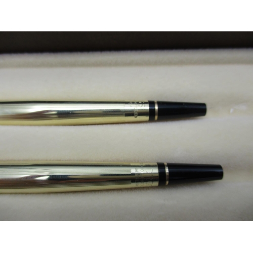 A Dunhill Gemline Classic gilt fountain pen with 14ct gold nib in Dunhill  box, together with a Cross