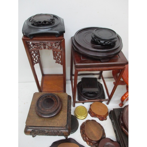 238 - A collection of Chinese hardwood stands and bases, of various shapes and sizes.