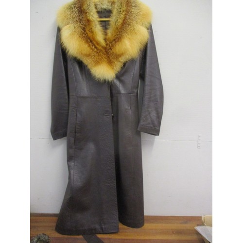 244 - A retro ladies dark brown leather coat with red fox fur collar, together with a full length mid brow... 