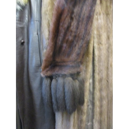 244 - A retro ladies dark brown leather coat with red fox fur collar, together with a full length mid brow... 