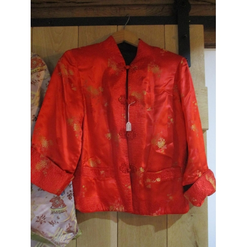 248 - Four items of mid to late 20th century Chinese export clothing to include two silk jackets, an embro... 