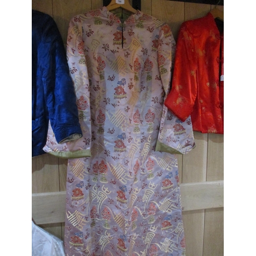 248 - Four items of mid to late 20th century Chinese export clothing to include two silk jackets, an embro... 