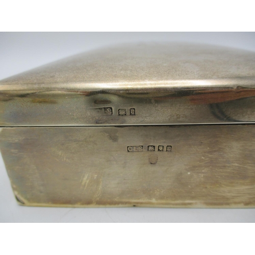 250 - A George V silver cigar box, London 1918, makers initials hallmarked C.L.S, of rectangular form with... 