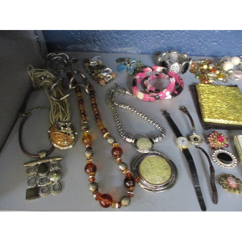 150 - A quantity of costume jewellery to include Indian White metal coin jewellery, gold coloured spectacl... 