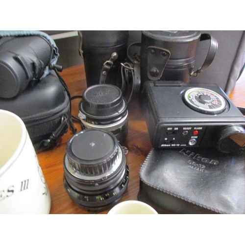 266 - Tamron camera lenses and other accessories, together with a pair of RSPB binoculars in travel case, ... 