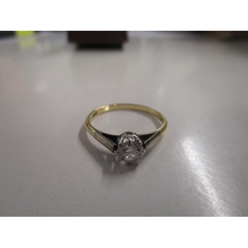 312 - An 18ct yellow gold and platinum diamond solitaire ring, total weight 2g