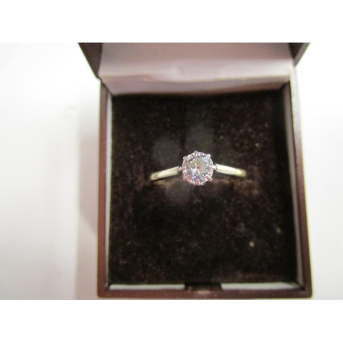 312 - An 18ct yellow gold and platinum diamond solitaire ring, total weight 2g