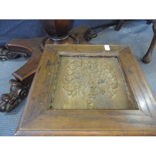 87 - An Arts & Crafts carved oak smokers cabinet depicting peacocks A/F