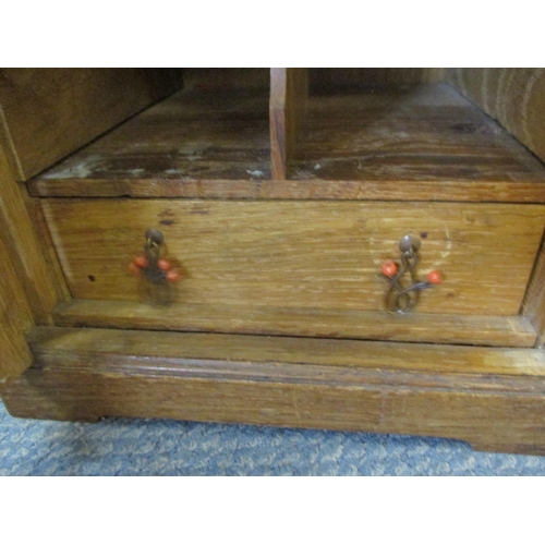 87 - An Arts & Crafts carved oak smokers cabinet depicting peacocks A/F