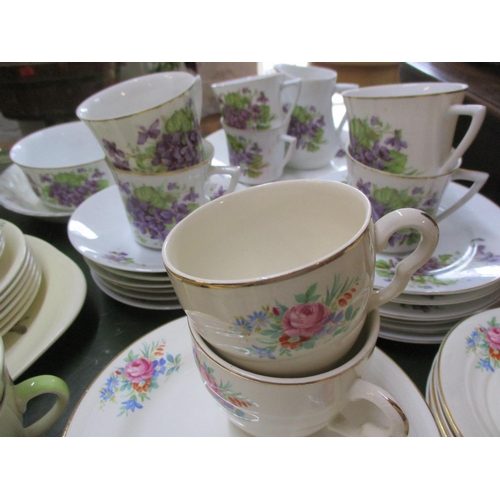 88 - Mixed vintage part tea sets, one depicting small violet sprays and the other a Royal Doulton The Cop... 