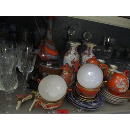 91 - Ceramics and glassware to include Satsuma vases, a soda syphon, wine and other glasses