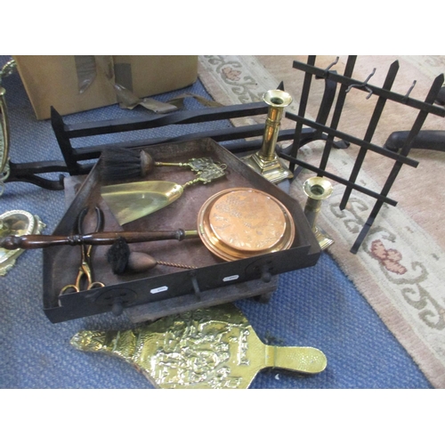 294 - Mixed metalware to include a pair of brass candlesticks, fire bellows, dressing table mirror, fire g... 