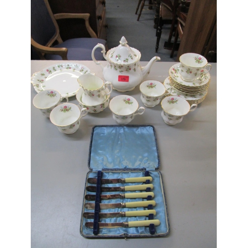 379 - A Royal Albert Winsome pattern part tea set comprising approximately 23 pieces, and a cased set of s... 