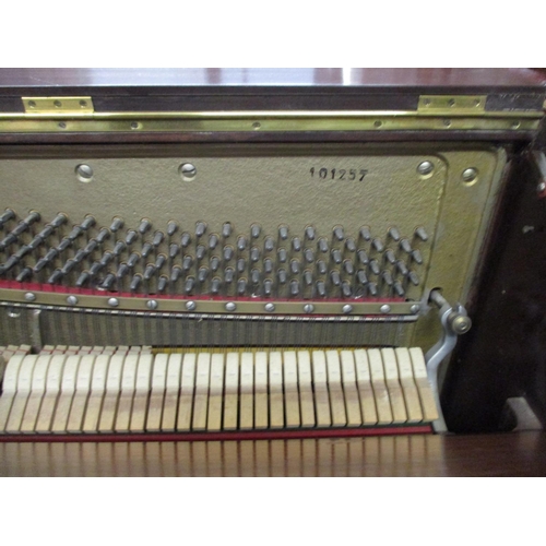 126 - A Bentley mahogany cased upright piano No.101257
Location: G