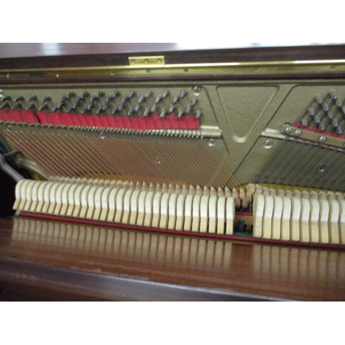 126 - A Bentley mahogany cased upright piano No.101257
Location: G