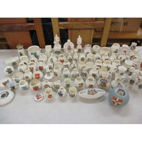 63 - A large quantity of Arcadian ware, W.H. Goss and similar ornaments together with a Carlton ware matc... 