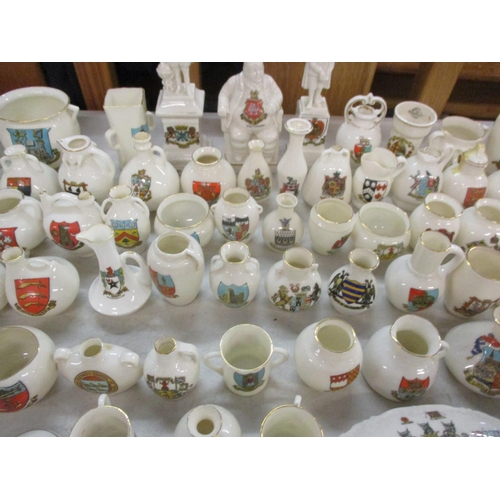 63 - A large quantity of Arcadian ware, W.H. Goss and similar ornaments together with a Carlton ware matc... 