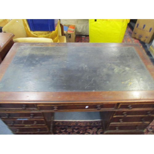 133 - A Victorian mahogany twin pedestal desk, the top with inset leather scriber, one long flanked by two... 