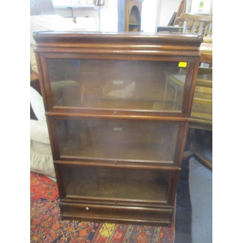 70 - An early 20th century Globe Wernicke three tier oak bookcase 137cm h x 87cm w