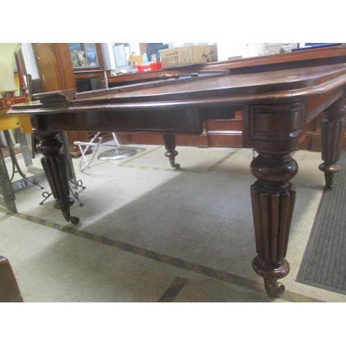 80 - A Victorian mahogany extending dining table on fluted tapering legs 74cm h x 172cm w extended