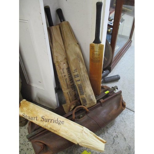 281 - A leather Gladstone cricket bag containing a Stuart Surridge & Co Ltd patent rapid driver cricket ba... 