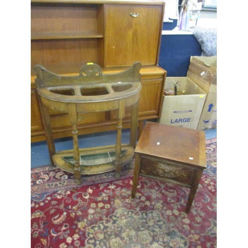 284 - An oak demi-lune stick/umbrella stand, a low wing back armchair and a mahogany commode