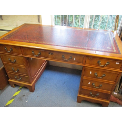 308 - A reproduction yew twin pedestal desk with red leather scriber