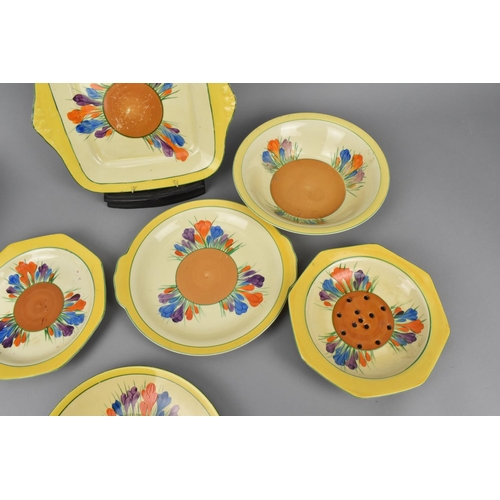 102 - A small collection of Clarice Cliff Autumn Crocus pattern plates and bowls, to include a berry bowl,... 