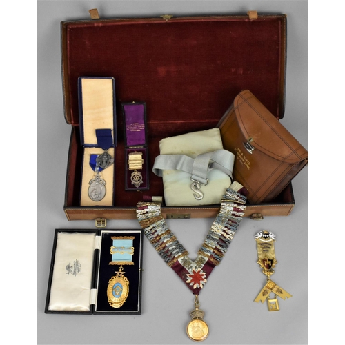 161 - A collection of Masonic medals presented to W. Bro. Bignell George Elliott, comprising an 18ct gold ... 