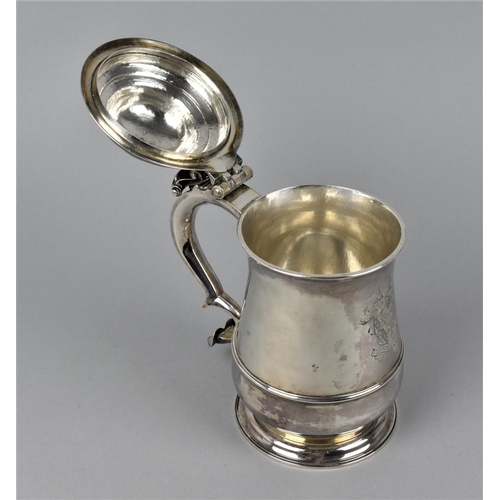 2 - A George II silver lidded tankard by Richard Gurney & Thomas Cook, London 1750, with a hinged, domed... 