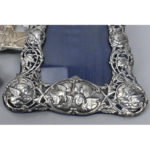 12 - An Edward VII silver frame by William Comyns, London 1901, in the Art Nouveau style with pierced fol... 