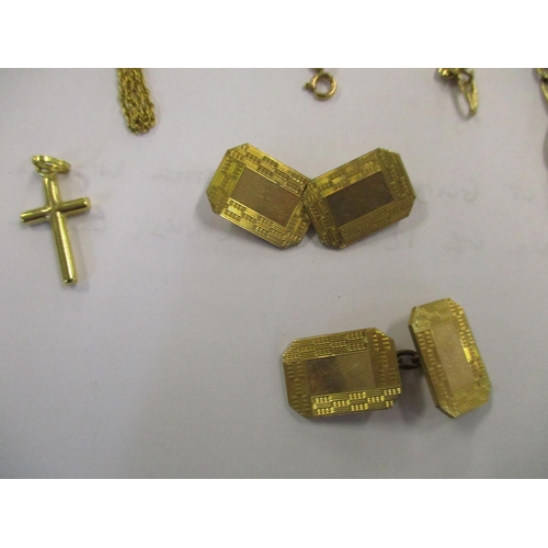 16 - Five 9ct gold chains together with a 9ct gold locket, a 9ct gold cross and a pair of 12ct gold cuff ... 