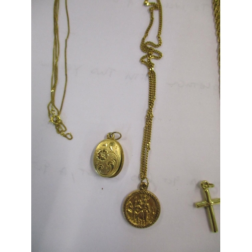 16 - Five 9ct gold chains together with a 9ct gold locket, a 9ct gold cross and a pair of 12ct gold cuff ... 