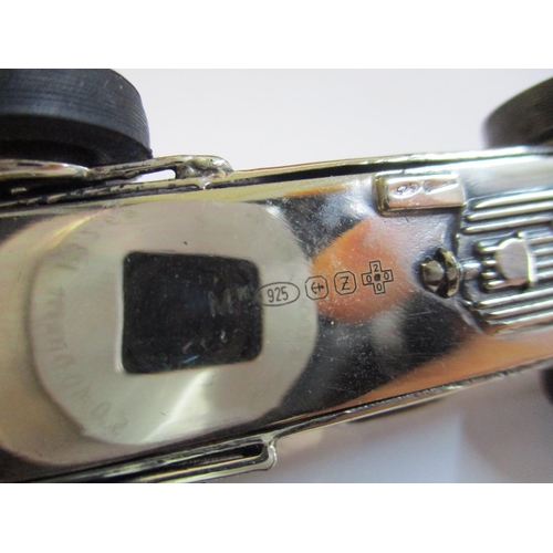 20 - A solid silver model of a vintage racing car, marked 925
Location: Cab