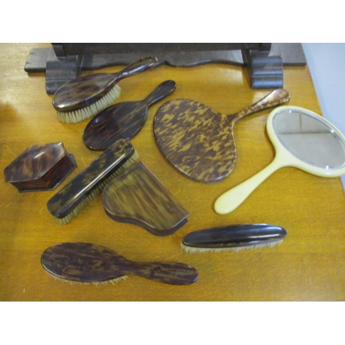 53 - A mid 20th century oak dressing table mirror, together with tortoiseshell boxes, mirrors and brushes... 