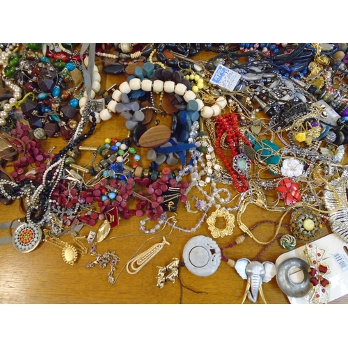 201 - A large selection of fashion costume jewellery to include beaded necklaces, brooches and other items... 