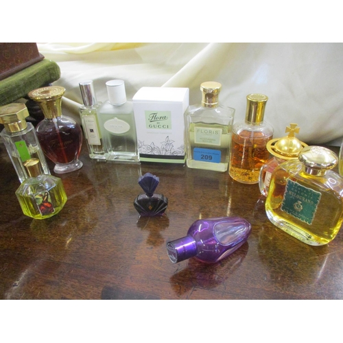 209 - A selection of vintage and modern fragrances to include Flora by Gucci Eau de Toilette 50ml, Infusio... 