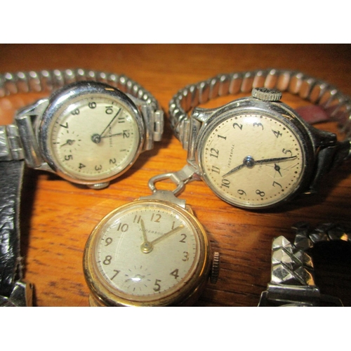 231 - Five vintage ladies Ingersoll wrist watches and a vintage Heuer pocket timer
Location: Cab