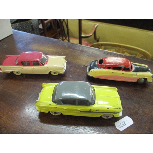 210 - Nine vintage Dinky cars to include a 471 Austin Nestle van, 180 Packard Clipper Sedan, Hudson Sedan,... 