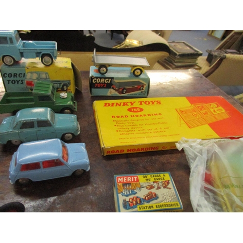 216 - A collection of Dinky and Corgi cars to include a Corgi 409 Forward Control Jeep FC-150, in original... 