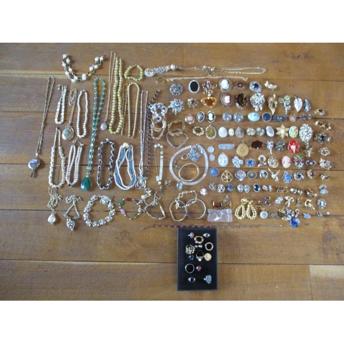 224 - Costume jewellery to include Continental brooches, cameo reproductions, cufflinks, earrings and neck... 