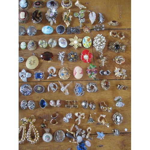 224 - Costume jewellery to include Continental brooches, cameo reproductions, cufflinks, earrings and neck... 