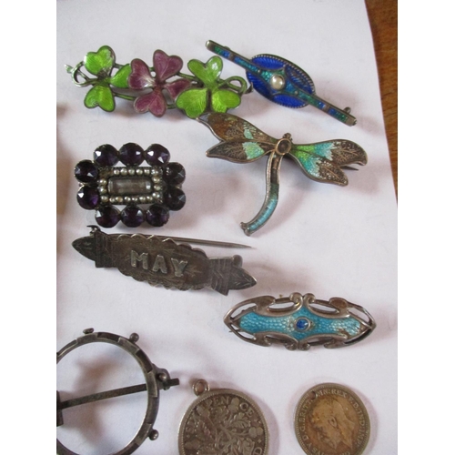 225 - Costume jewellery to include a 19th century mourning brooch, three white metal identity bracelets, f... 