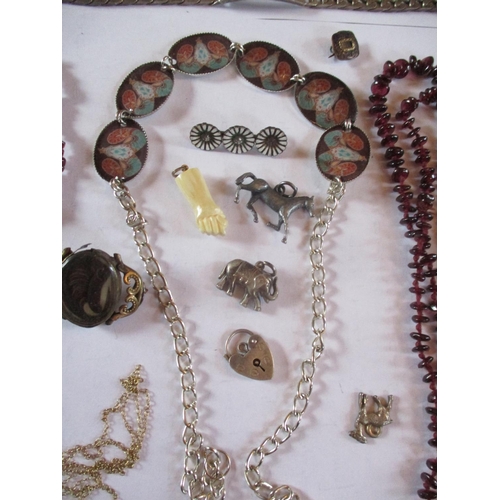 225 - Costume jewellery to include a 19th century mourning brooch, three white metal identity bracelets, f... 